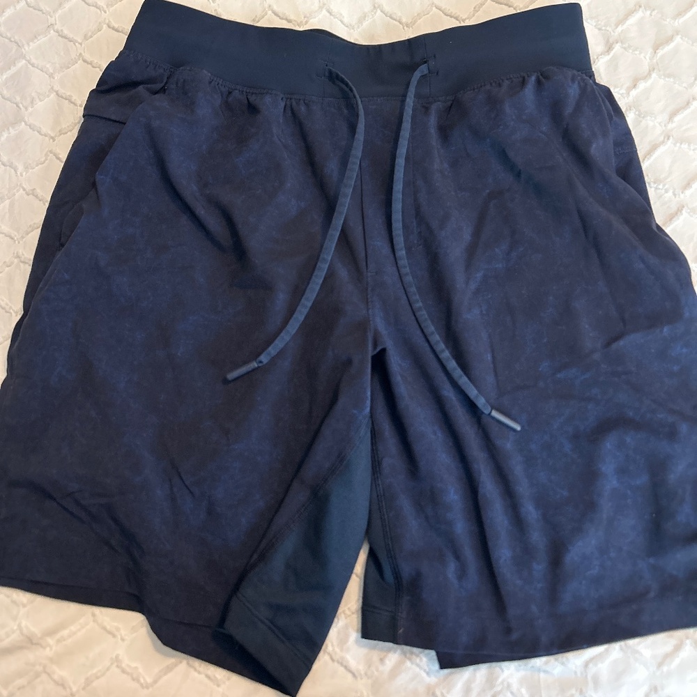 Navy lululemon pace breaker shorts 7inch